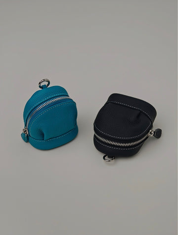 Rilo top-grain leather mini backpack charms in blue and black